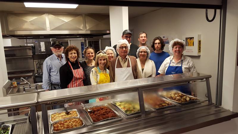 GRJC members serving a meal at a local food pantry